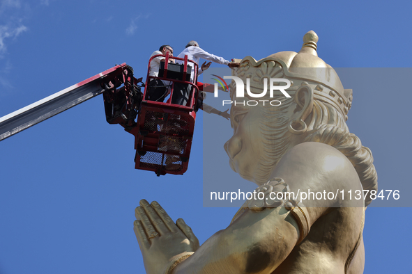 Pooja and grand abhishekam are celebrating the 8th anniversary of the installation of the 50-foot tall statue of Lord Hanuman at the Vishnu...