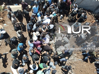 Syrians participated in the funeral of a man killed during clashes with Turkish forces in Afrin, northern Syria, on July 2, 2024. Four peopl...