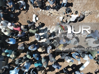 Syrians participated in the funeral of a man killed during clashes with Turkish forces in Afrin, northern Syria, on July 2, 2024. Four peopl...