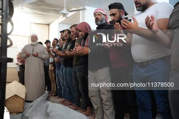 Syrians participated in the funeral of a man killed during clashes with Turkish forces in Afrin, northern Syria, on July 2, 2024. Four peopl...