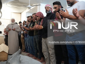 Syrians participated in the funeral of a man killed during clashes with Turkish forces in Afrin, northern Syria, on July 2, 2024. Four peopl...