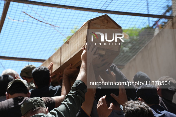 Syrians participated in the funeral of a man killed during clashes with Turkish forces in Afrin, northern Syria, on July 2, 2024. Four peopl...