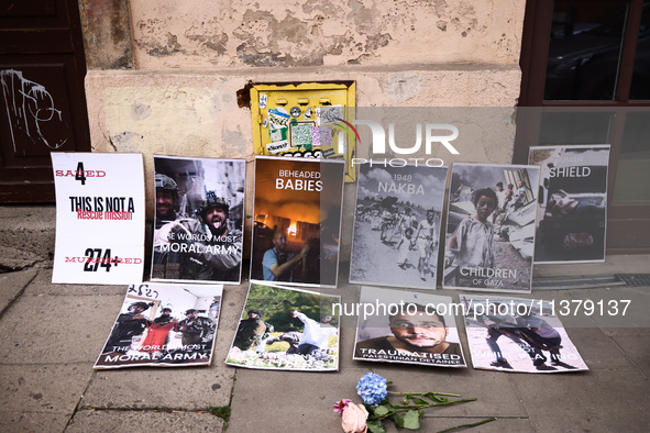 Banners are seen during solidarity with Palestine demonstration at Kazimierz, the Jewish historic district in Krakow, Poland on June 30, 202...