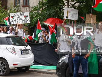 People attend solidarity with Palestine demonstration at Kazimierz, the Jewish historic district in Krakow, Poland on June 30, 2024.  A prot...