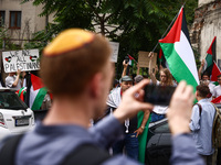 People attend solidarity with Palestine demonstration at Kazimierz, the Jewish historic district in Krakow, Poland on June 30, 2024.  A prot...