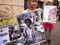 People attend solidarity with Palestine demonstration at Kazimierz, the Jewish historic district in Krakow, Poland on June 30, 2024.  A prot...