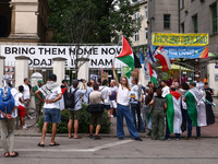 People attend solidarity with Palestine demonstration in front of the Jewish Community Center (JCC) in Kazimierz, the Jewish historic distri...