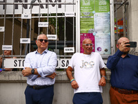 Rabbi Avi Baumol s (Left) and Jonathan Ornstein, the director of the Jewish Community Center (JCC) stand while solidarity with Palestine dem...