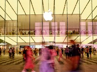 People are experiencing Apple products at an Apple product store in Hangzhou, China, on June 18, 2024. On July 2, 2024, Apple's Vision Pro s...