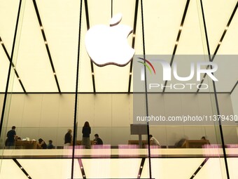 People are experiencing Apple products at an Apple product store in Hangzhou, China, on June 18, 2024. On July 2, 2024, Apple's Vision Pro s...