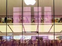 People are experiencing Apple products at an Apple product store in Hangzhou, China, on June 18, 2024. On July 2, 2024, Apple's Vision Pro s...