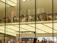 People are experiencing Apple products at an Apple product store in Hangzhou, China, on June 18, 2024. On July 2, 2024, Apple's Vision Pro s...