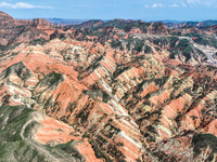 An aerial photo is showing the Danxia landform group in Xinghua village, Lanzhou city, northwest China's Gansu province, in Lanzhou, China,...