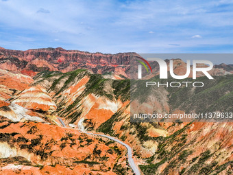 An aerial photo is showing the Danxia landform group in Xinghua village, Lanzhou city, northwest China's Gansu province, in Lanzhou, China,...