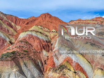 An aerial photo is showing the Danxia landform group in Xinghua village, Lanzhou city, northwest China's Gansu province, in Lanzhou, China,...