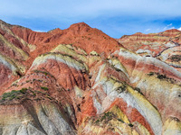 An aerial photo is showing the Danxia landform group in Xinghua village, Lanzhou city, northwest China's Gansu province, in Lanzhou, China,...