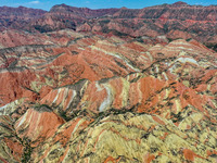 An aerial photo is showing the Danxia landform group in Xinghua village, Lanzhou city, northwest China's Gansu province, in Lanzhou, China,...