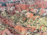 An aerial photo is showing the Danxia landform group in Xinghua village, Lanzhou city, northwest China's Gansu province, in Lanzhou, China,...