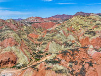 An aerial photo is showing the Danxia landform group in Xinghua village, Lanzhou city, northwest China's Gansu province, in Lanzhou, China,...