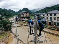 A line is being repaired in Si'an village, Rongan County, Liuzhou City, South China's Guangxi Zhuang Autonomous region, on July 2, 2024. (