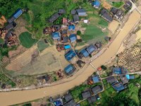 An aerial photo is showing Si 'an village after a flood in Rongan county, Liuzhou, China, on July 2, 2024, in South China's Guangxi Zhuang A...