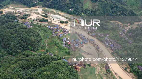 An aerial photo is showing Si 'an village after a flood in Rongan county, Liuzhou, China, on July 2, 2024, in South China's Guangxi Zhuang A...