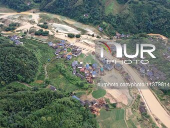 An aerial photo is showing Si 'an village after a flood in Rongan county, Liuzhou, China, on July 2, 2024, in South China's Guangxi Zhuang A...