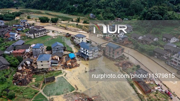 An aerial photo is showing Si 'an village after a flood in Rongan county, Liuzhou, China, on July 2, 2024, in South China's Guangxi Zhuang A...