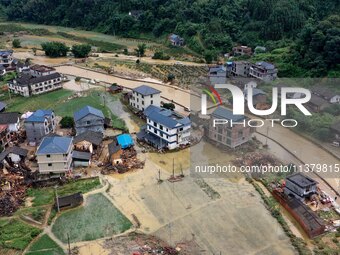 An aerial photo is showing Si 'an village after a flood in Rongan county, Liuzhou, China, on July 2, 2024, in South China's Guangxi Zhuang A...