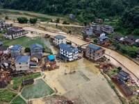 An aerial photo is showing Si 'an village after a flood in Rongan county, Liuzhou, China, on July 2, 2024, in South China's Guangxi Zhuang A...