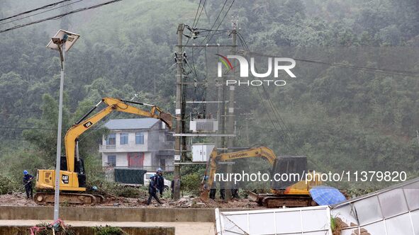 A line is being repaired in Si'an village, Rongan County, Liuzhou City, South China's Guangxi Zhuang Autonomous region, on July 2, 2024. 