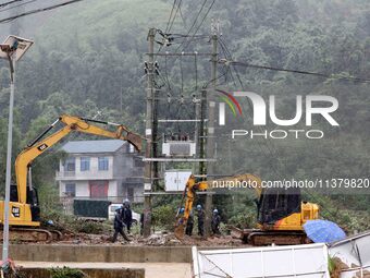 A line is being repaired in Si'an village, Rongan County, Liuzhou City, South China's Guangxi Zhuang Autonomous region, on July 2, 2024. (