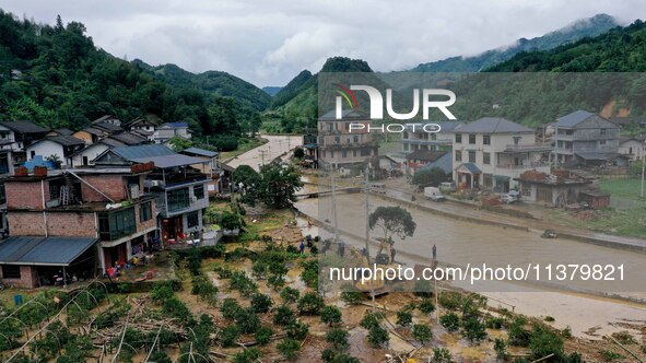 A line is being repaired in Si'an village, Rongan County, Liuzhou City, South China's Guangxi Zhuang Autonomous region, on July 2, 2024. 