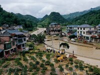 A line is being repaired in Si'an village, Rongan County, Liuzhou City, South China's Guangxi Zhuang Autonomous region, on July 2, 2024. (