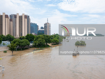 Water is rising in the Nanjing section of the Yangtze River in Nanjing, China, on July 3, 2024. (