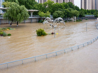 A pedestrian walkway and a platform are flooding in the Nanjing section of the Yangtze River in Nanjing, Jiangsu province, China, on July 3,...