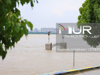 Water is rising in the Nanjing section of the Yangtze River in Nanjing, China, on July 3, 2024. (