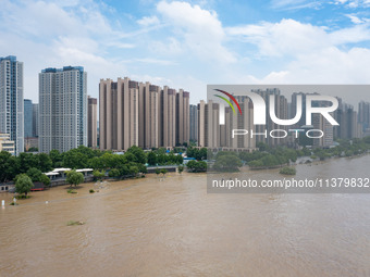 Water is rising in the Nanjing section of the Yangtze River in Nanjing, China, on July 3, 2024. (