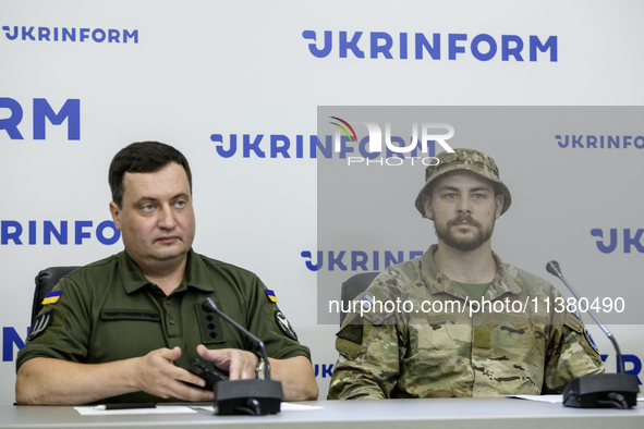 Andriy Yusov (L), a representative of the Defence Intelligence of Ukraine, and a Russian citizen, a direct perpetrator of the action, who is...