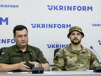 Andriy Yusov (L), a representative of the Defence Intelligence of Ukraine, and a Russian citizen, a direct perpetrator of the action, who is...