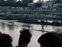 Villagers are watching as SDRF is launching an operation to trace the body of a young man who drowned in Nalla Puhroo while taking a bath on...