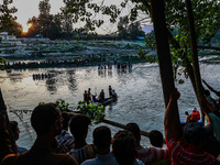 Villagers are watching as SDRF is launching an operation to trace the body of a young man who drowned in Nalla Puhroo while taking a bath on...