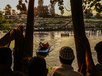 Villagers are watching as SDRF is launching an operation to trace the body of a young man who drowned in Nalla Puhroo while taking a bath on...