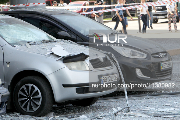 Cars are being damaged by the Russian missile strike in Dnipro, Ukraine, on July 3, 2024. At least five people are being killed and 34 peopl...