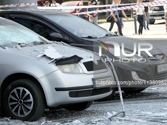 Cars are being damaged by the Russian missile strike in Dnipro, Ukraine, on July 3, 2024. At least five people are being killed and 34 peopl...