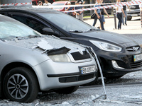 Cars are being damaged by the Russian missile strike in Dnipro, Ukraine, on July 3, 2024. At least five people are being killed and 34 peopl...