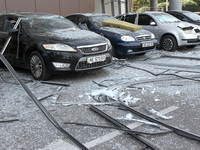 Damaged cars are being pictured outside a shopping mall affected by the Russian missile strike in Dnipro, Ukraine, on July 3, 2024. At least...