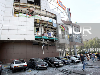 Damaged cars are being pictured outside a shopping mall affected by the Russian missile strike in Dnipro, Ukraine, on July 3, 2024. At least...