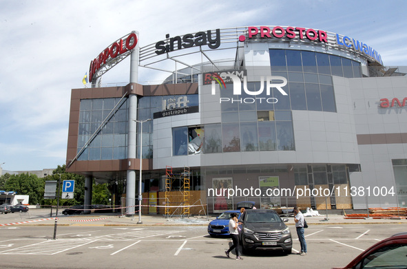 A shopping mall is being damaged by a Russian missile strike in Dnipro, Ukraine, on July 3, 2024. At least five people are being killed and...