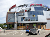 A shopping mall is being damaged by a Russian missile strike in Dnipro, Ukraine, on July 3, 2024. At least five people are being killed and...